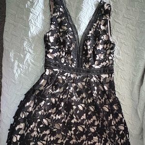 Romeo & Juliet Black lace with beige lining . Size Medium